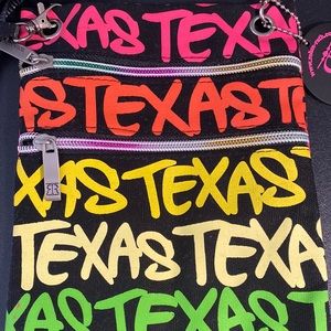 Texas crossbody adjustable zipper bag. Robin Ruth. Never been used.